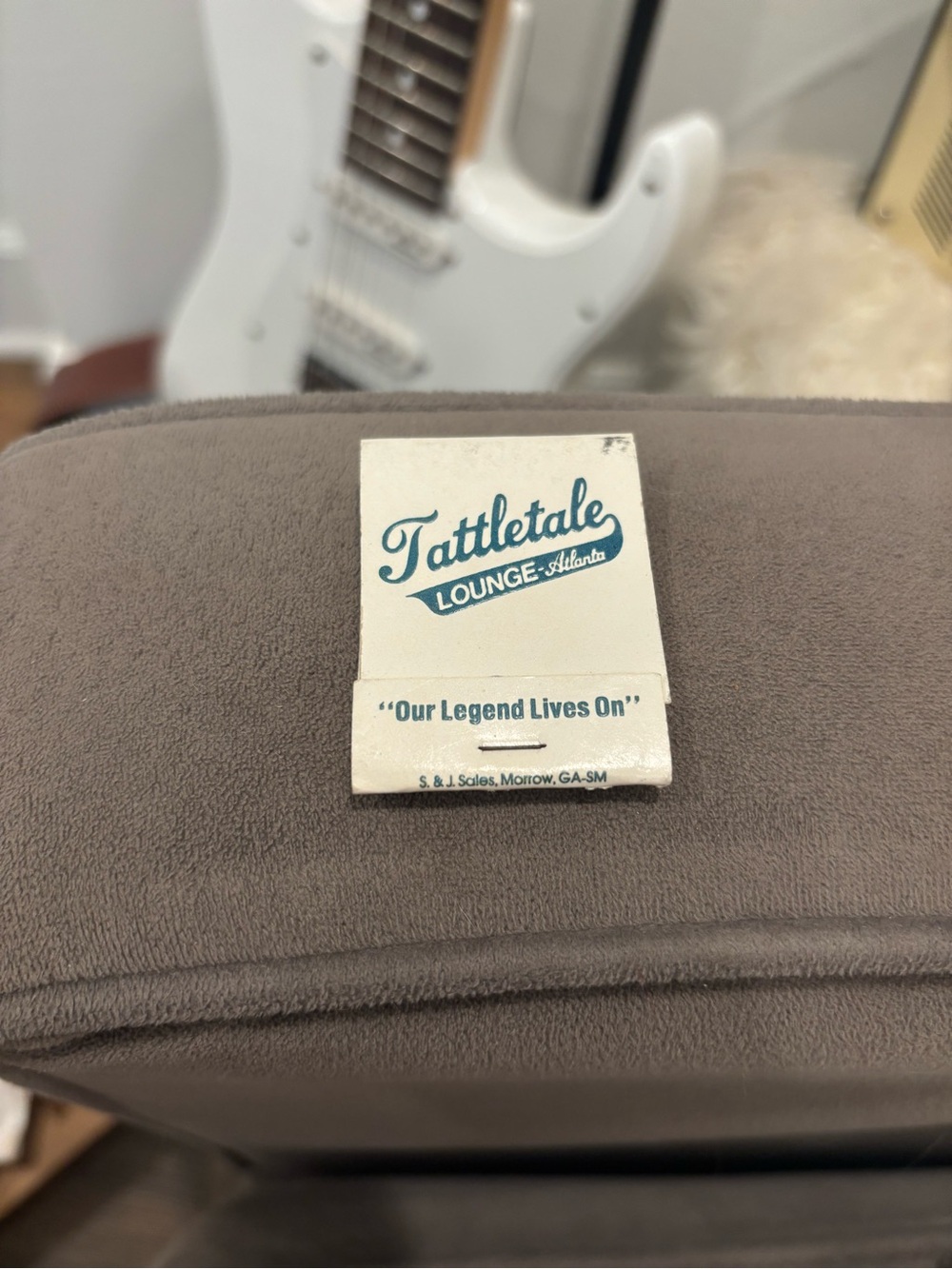 Tattletale Lounge Matchbook - White with Teal Logo
